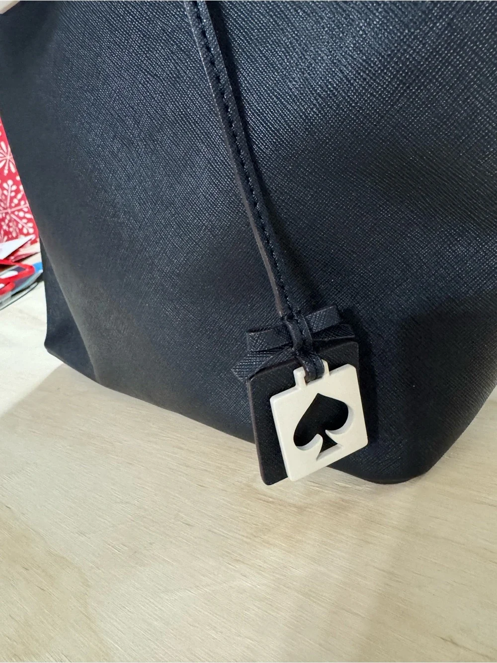 kate spade black saffiano tote with gold accents